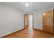Bedroom with hardwood floors, ceiling fan, and ensuite bathroom at 5918 Efland Cedar Grove Rd, Cedar Grove, NC 27231