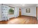 A bright living room with hardwood floors and good natural light at 5918 Efland Cedar Grove Rd, Cedar Grove, NC 27231