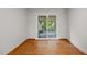 Cozy sun room with sliding glass doors and hardwood floors at 5918 Efland Cedar Grove Rd, Cedar Grove, NC 27231