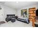 Home gym featuring a treadmill, comfortable seating, and ample space for workouts at 6 Womble Cir, Durham, NC 27705