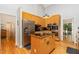 Well-equipped kitchen with modern stainless steel appliances and custom wood cabinetry at 6 Womble Cir, Durham, NC 27705