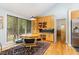 Breakfast nook featuring a built-in desk and storage and views of the wooded lot at 6 Womble Cir, Durham, NC 27705