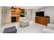 Cozy living area with kitchenette, perfect for relaxing and entertaining guests in comfort at 6 Womble Cir, Durham, NC 27705