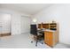 Functional office space with a desk, storage, and natural light, ideal for work or study at 6 Womble Cir, Durham, NC 27705