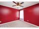 Bright bedroom with neutral carpet and natural light from the window at 615 Southshore Pkwy, Durham, NC 27703