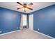 Comfortable bedroom with neutral carpet and ceiling fan with light at 615 Southshore Pkwy, Durham, NC 27703