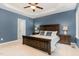 Primary bedroom with ceiling fan, recessed lighting, and ensuite bathroom access at 6717 Country Hollows Ln, Holly Springs, NC 27540