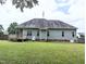 Expansive backyard with a deck and ample space for outdoor activities and gatherings at 70 Dexterfield Dr, Fuquay Varina, NC 27526