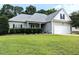 Charming single-story home featuring a two-car garage and well-maintained landscaping in a suburban setting at 70 Dexterfield Dr, Fuquay Varina, NC 27526