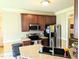 Kitchen featuring granite countertops, stainless steel appliances, and ample cabinet space at 70 Dexterfield Dr, Fuquay Varina, NC 27526