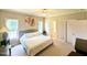 This spacious main bedroom features carpet floors and an en-suite bathroom at 70 Dexterfield Dr, Fuquay Varina, NC 27526