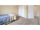 Bedroom featuring carpet flooring, a bed, and closet at 702 Calavaras Ln, Knightdale, NC 27545
