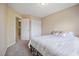 Bedroom with carpet flooring, closet, a double bed and natural light from window at 702 Calavaras Ln, Knightdale, NC 27545