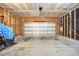 Spacious two car garage with concrete flooring at 702 Calavaras Ln, Knightdale, NC 27545