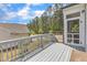 Relaxing back deck offering picturesque treetop views, perfect for outdoor enjoyment and entertaining at 704 Haven Peak Ln, Wake Forest, NC 27587