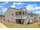 Charming backyard with a screened porch, spacious deck, and well-manicured lawn at 704 Haven Peak Ln, Wake Forest, NC 27587