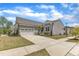 Charming single-Gathering home with a two-car garage and a well-manicured lawn in a residential neighborhood at 704 Haven Peak Ln, Wake Forest, NC 27587