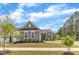 Beautiful home with gray siding, a well-maintained lawn, and lovely landscaping at 704 Haven Peak Ln, Wake Forest, NC 27587