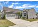 Charming single-Gathering home with a two-car garage and a well-manicured lawn in a residential neighborhood at 704 Haven Peak Ln, Wake Forest, NC 27587