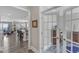 View through the open french doors, highlighting the kitchen and dining area at 704 Haven Peak Ln, Wake Forest, NC 27587