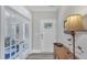 Entryway showcasing hardwood floors, elegant french doors, and neutral paint at 704 Haven Peak Ln, Wake Forest, NC 27587