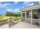 Enjoy outdoor living with this screened-in back deck overlooking a green space and landscaped yard at 710 Legacy Falls S Dr, Chapel Hill, NC 27517