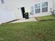 Cozy backyard with a small patio area and lawn at 711 Keystone Park Dr # 78, Morrisville, NC 27560