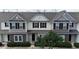 Exterior elevation featuring a well-manicured lawn and a two-story layout at 711 Keystone Park Dr # 78, Morrisville, NC 27560