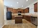 Traditional kitchen with ample cabinet space and center island at 711 Keystone Park Dr # 78, Morrisville, NC 27560
