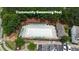 Aerial view of a refreshing community pool with lounge chairs and lush surrounding greenery at 711 Keystone Park Dr # 78, Morrisville, NC 27560