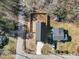 Overhead view of a property with a fenced backyard and a long driveway at 717 Utley St, Holly Springs, NC 27540