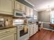 The kitchen offers great appliances, granite countertops, and a quaint eating area at 7312 Sweet Bay Ln, Raleigh, NC 27615