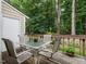 Covered patio with table and seating provides outdoor enjoyment at 7312 Sweet Bay Ln, Raleigh, NC 27615
