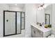 This bathroom features a spacious walk-in shower and modern vanity at 772 Mirkwood Ave, Apex, NC 27523