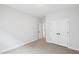 Bedroom boasts neutral walls, plush carpet, closet, and ensuite access for added convenience at 772 Mirkwood Ave, Apex, NC 27523