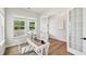 Bright home office with desk, decor, and natural light from a large window at 772 Mirkwood Ave, Apex, NC 27523