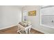 Bright office space with desk, decor, and natural light from two windows at 772 Mirkwood Ave, Apex, NC 27523