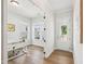 Bright office featuring hardwood floors, natural light, and a stylish desk at 772 Mirkwood Ave, Apex, NC 27523