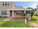 Backyard patio has a retractable awning and offers plenty of shade at 7873 Cape Charles Dr, Raleigh, NC 27617
