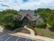 Well-manicured landscaping enhances this cozy community clubhouse at 7873 Cape Charles Dr, Raleigh, NC 27617