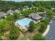 Community pool and clubhouse offer residents a resort-style living experience at 7873 Cape Charles Dr, Raleigh, NC 27617