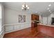 Bright kitchen featuring a center island, stainless steel appliances, and beautiful hardwood flooring at 7873 Cape Charles Dr, Raleigh, NC 27617