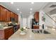 Kitchen area with granite countertops, stainless appliances and center island at 7873 Cape Charles Dr, Raleigh, NC 27617