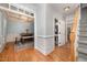 Welcoming foyer with hardwood floors leading to dining room and staircase at 804 Town Side Dr, Apex, NC 27502