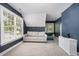 Sunlit living room with comfortable seating and a view of the outdoors at 804 Town Side Dr, Apex, NC 27502