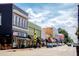 Charming downtown street view with shops, restaurants, and pedestrian-friendly sidewalks at 804 Town Side Dr, Apex, NC 27502