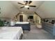 Unique bedroom with a sloped ceiling, modern furnishings, and a cozy beanbag chair for relaxing at 83 Sawyer Ct, Wendell, NC 27591