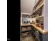 Organized pantry offering ample shelving and storage space for kitchen essentials at 83 Sawyer Ct, Wendell, NC 27591