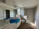 Bathroom features a double vanity, large mirror, and tiled shower at 88 Willow Cameron Way, Angier, NC 27501