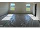 Bedroom with two windows providing natural light and views of the outdoors at 88 Willow Cameron Way, Angier, NC 27501